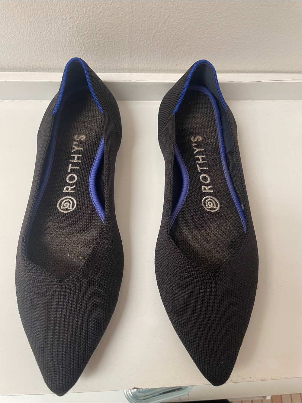 Rothy's Black Pointed Knit Flats with Blue Trim